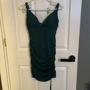 Emerald green; medium; comes with padding; tie back